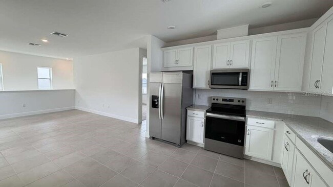Building Photo - 10239 Dulbecco St