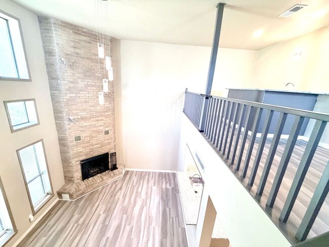 Building Photo - Stylish Two-Story Duplex with Loft, Fireplace & Private Backyard in New Braunfels!