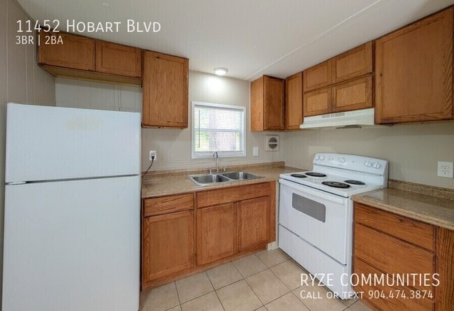 Building Photo - 11452 Hobart Blvd
