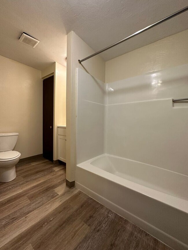 Building Photo - Amazing 1 Bedroom with Beautiful Exposed Brick! Off-Street Parking & Laundry Included!