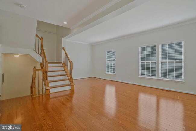 Building Photo - This beautifully maintained brick-front, three-level townhome is located in a highly sought-after...