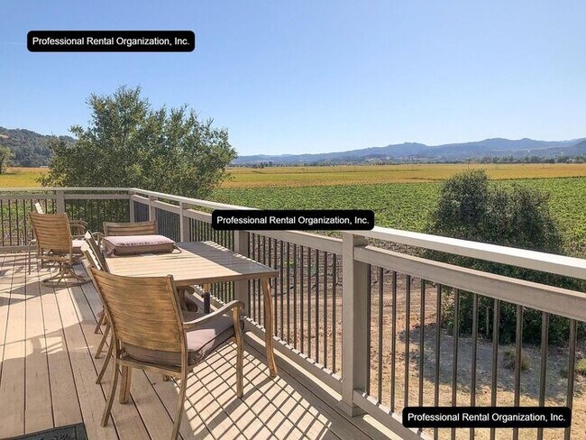 Building Photo - A price and views that can't be beat- Upper Flat with deck & expansive Vineyard and Sunset views