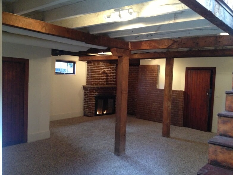 Basement w/ fireplace - 3634 NE Cleveland Ave