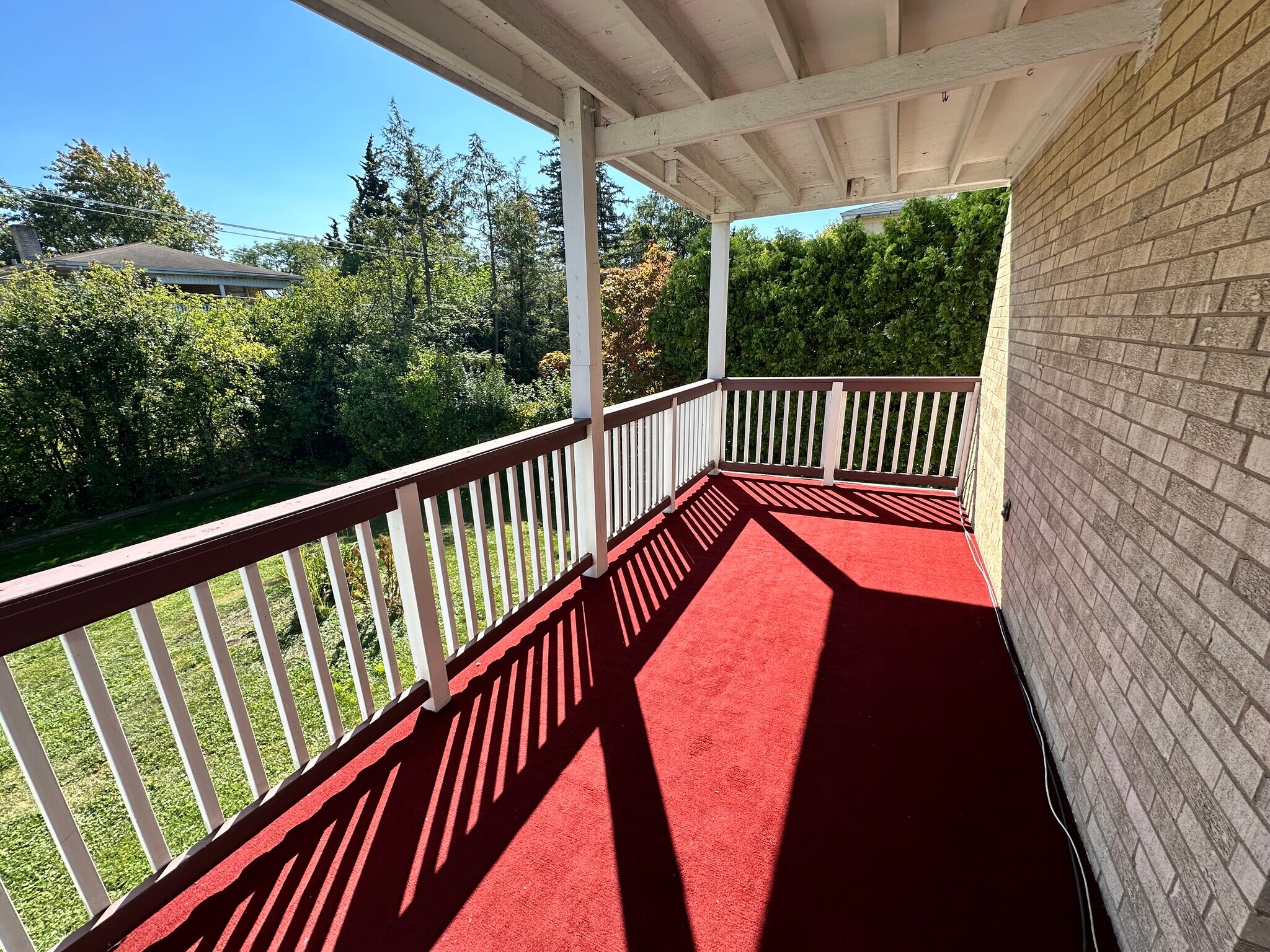 Outdoor balcony with overhead cover. - 671 56th St