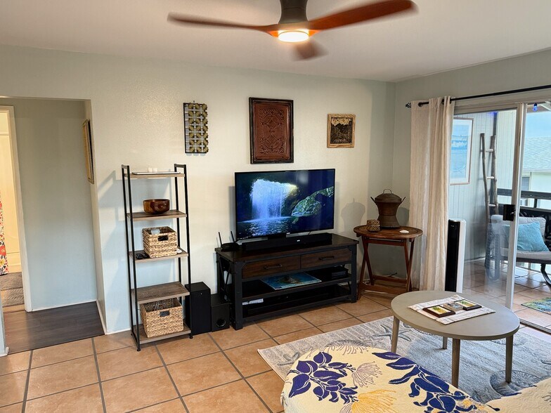 TV with art; New ceiling fans - 74-5618 Palani Rd