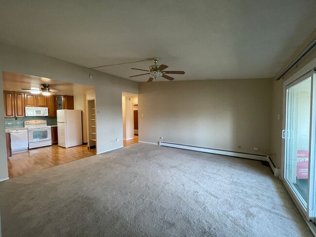 Building Photo - Spacious Top-Floor Condo in 55+ Community