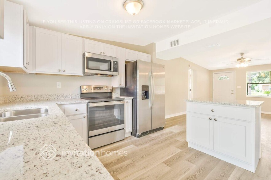 Building Photo - 7418 Impala Ln