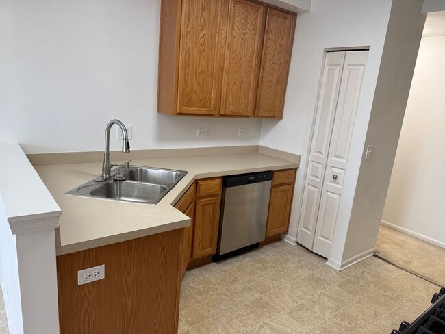 Building Photo - Partially Furnished - Bright & Spacious 2BR/1.5 BA CONDO - End-Unit w/ 2-Car Garage, Appliances, ...