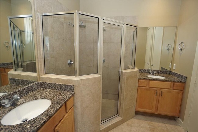 Building Photo - Elegant Gated Townhome Offering Unparallel...