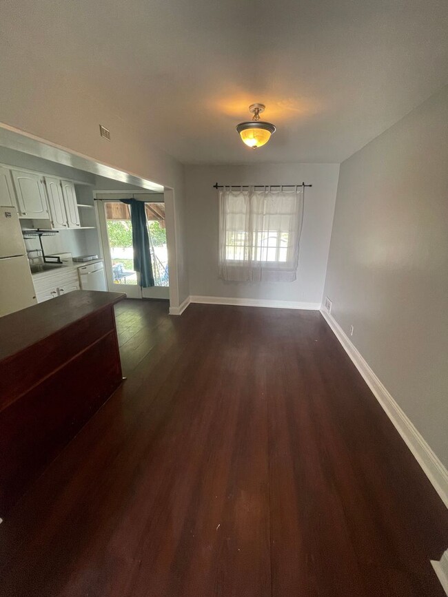 Building Photo - Freshly Painted 3 Bedroom House with Basem...