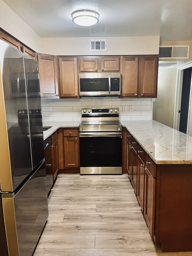 Building Photo - 3663 S Sheridan Blvd