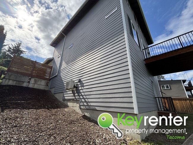 Building Photo - Stylish 4-Bedroom Home with Finished Basem...