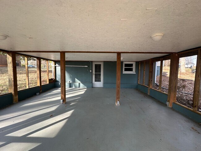 Building Photo - House in Bedford with Lot of Outdoor Space.