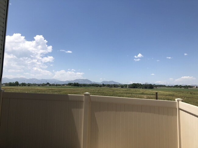Building Photo - Charming 3-Story Townhome with Stunning Mountain Views & Open Space Privacy | Lafayette, CO