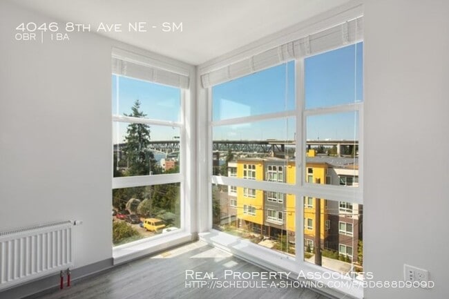 Building Photo - 4046 8th Ave NE