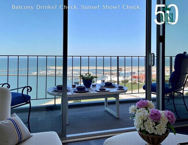 Building Photo - Just Unpack, Pour a Beverage, & Cue the Su...