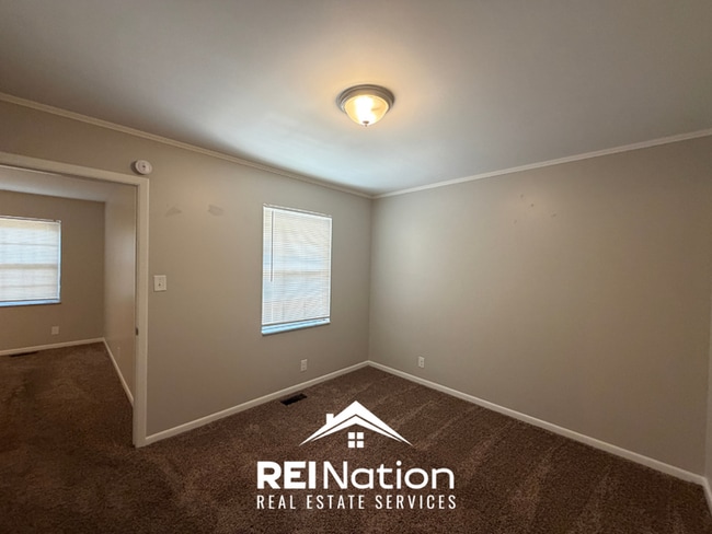 Building Photo - MASSIVE BESSEMER RENTAL! 4BR/2.5BA | High Ceilings & Brick Fireplace | 2-Car Garage!