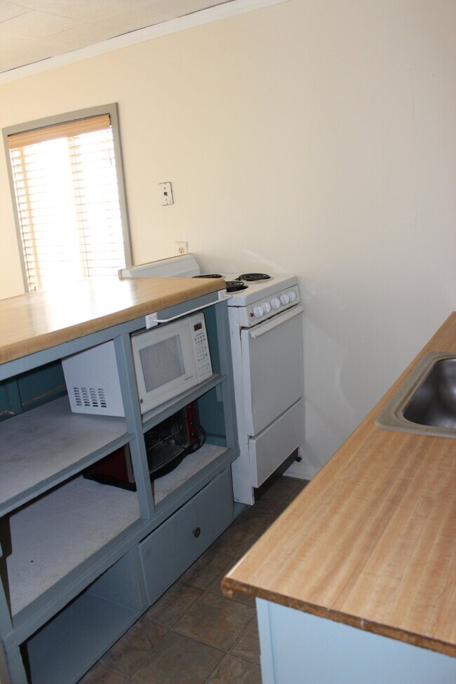 Building Photo - "Charming 1-Bedroom Duplex in Golden, CO – Cozy 500 Sq. Ft. Living!"