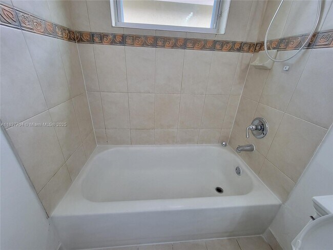 Building Photo - 4949 SW 134th Ave