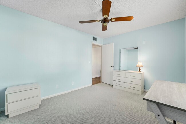 Building Photo - 5900 Whispering Pine Way