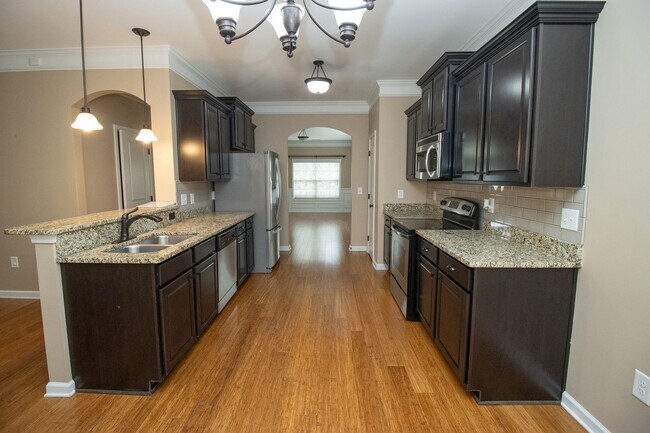 Building Photo - Elegant All-Brick 4 Bedroom Home on a Quie...