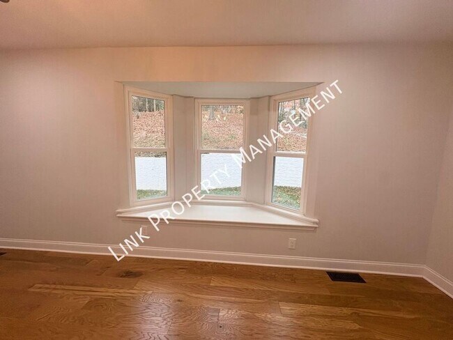 Building Photo - JUST REDUCE!  Sophisticated Tri-Level Home in Stuart Heights — Modern Comfort & Timeless Charming...