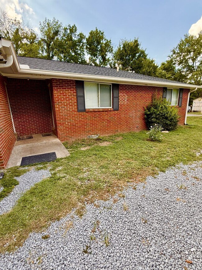 Primary Photo - 2 BR 1 Bath Duplex with convenient airport...