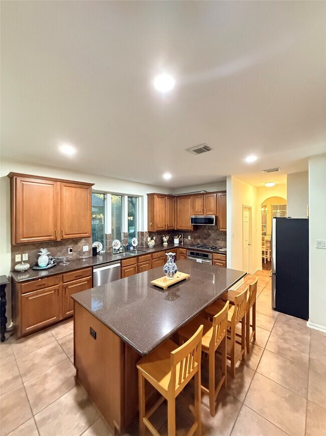 Building Photo - 18406 S Roaring River Ct