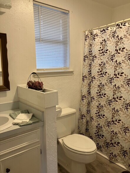 Cute bathroom with under counter and medicine cabinet storage edicine - 20681 FM306