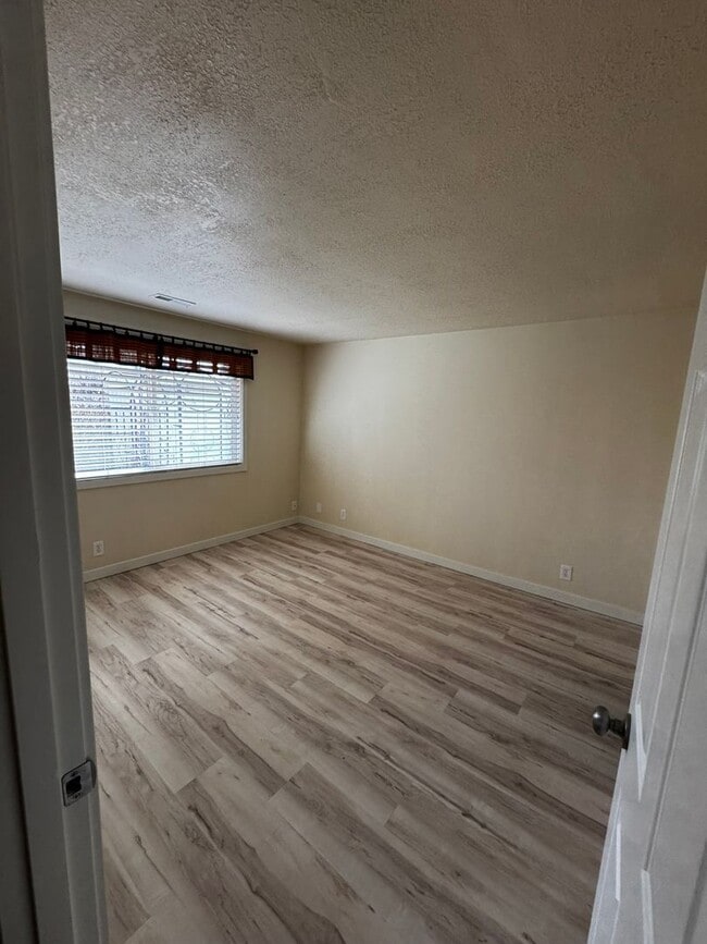 Building Photo - Charming 3 Bedroom Home with Beautiful Backyard & RV Parking