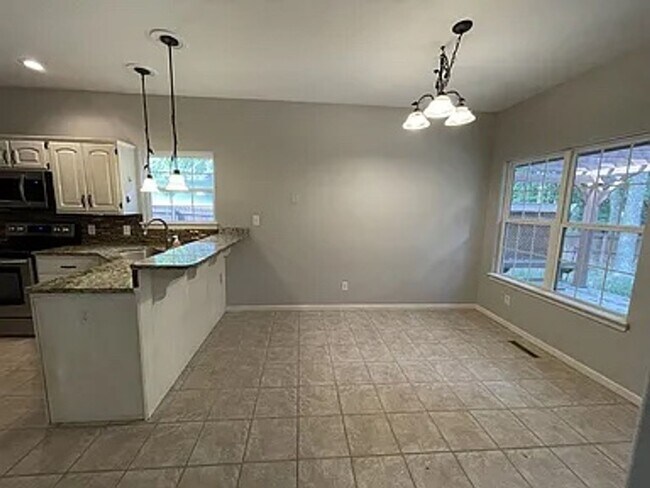 Building Photo - Here is your chance for a fancy 4 bedroom,...