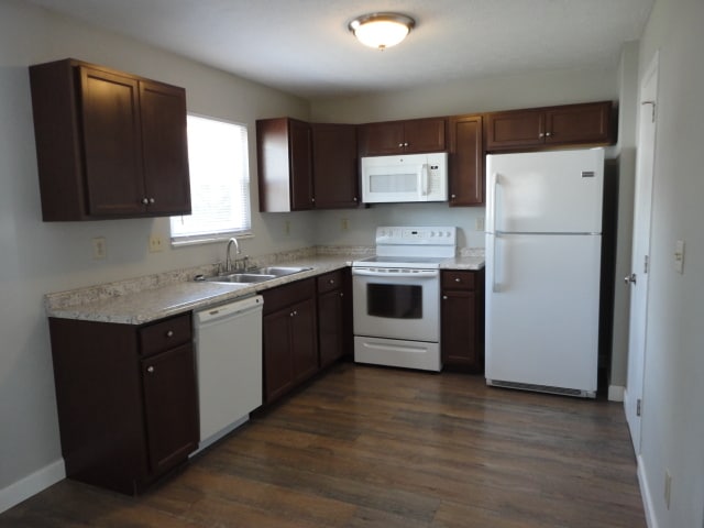Updated kitchen with dishwasher, microwave, smooth cooktop stove and refrigerator/freezer - 7960 Bobtail Ct