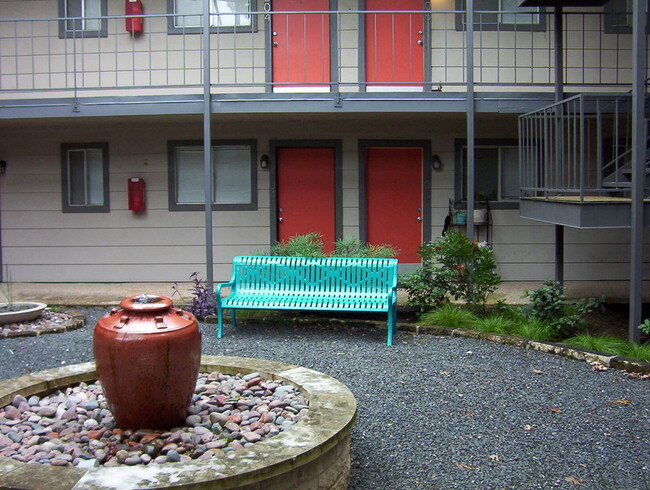 Casa 39 Apartments outdoor common area with fountain - Casa 39