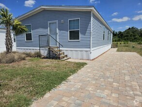 Building Photo - 6721 Hidden Oaks Dr