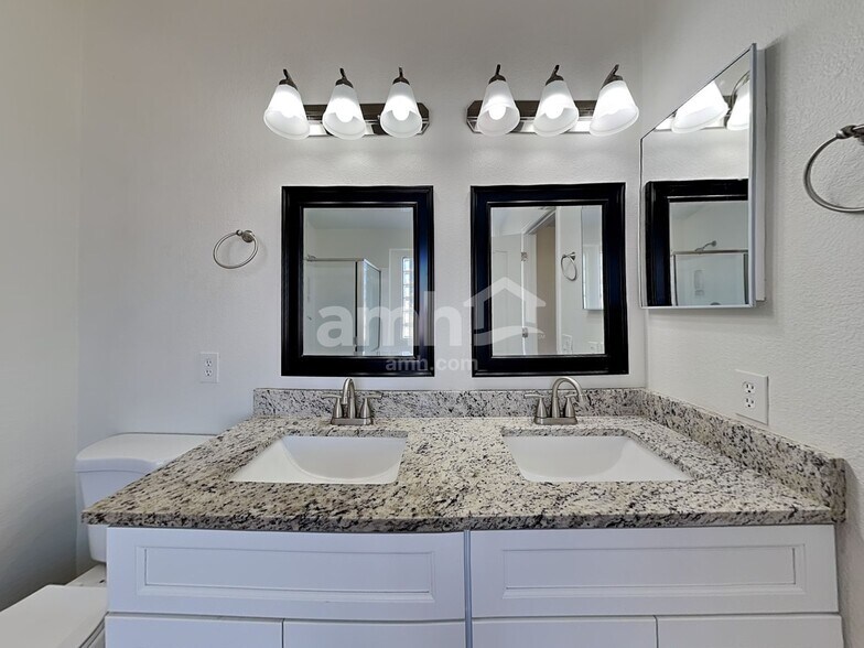 Building Photo - 9824 E Onza Ave