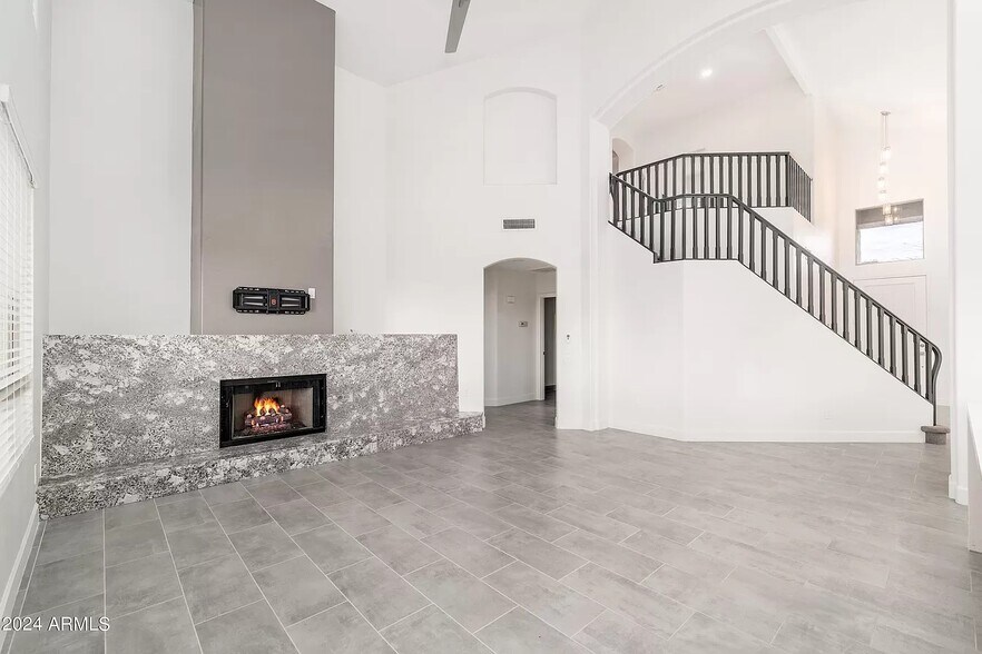 Building Photo - 6739 E Gelding Dr