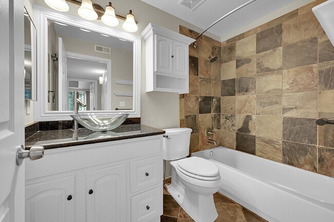 Building Photo - $1,750 - 2-Bed /1 bath Condo with Cozy Fir...