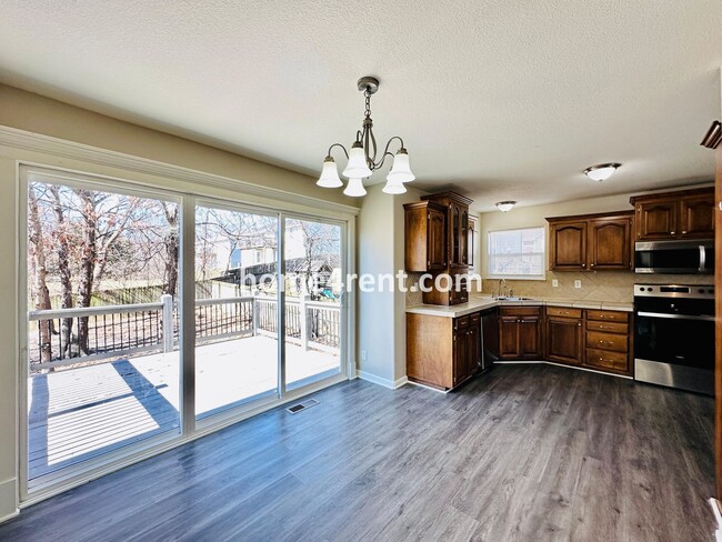 Building Photo - Spacious Four Bedroom Northland Home with a Finished Basement, 3 car garage and Fenced Yard!