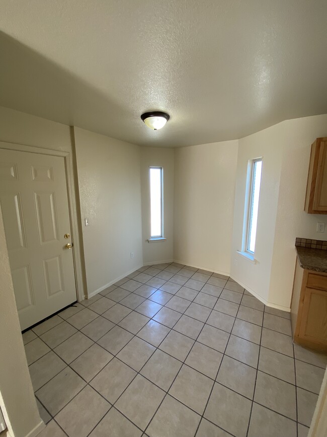 Breakfast area door to backyard - 8495 Roseway Dr