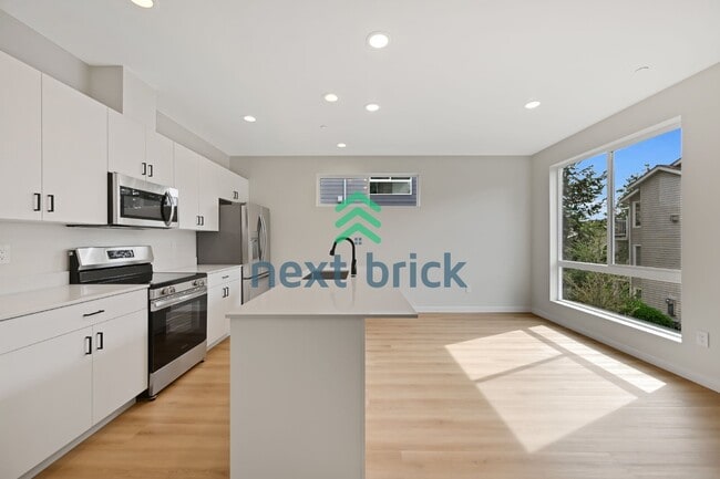 Building Photo - Brand-New 2026 Townhome | 3 Bed | 2.5 Bath | 1,560 Sq Ft | EV Garage | A/C Included