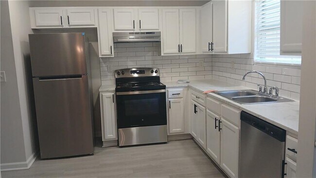 Building Photo - 5677 Wind Gate Ln