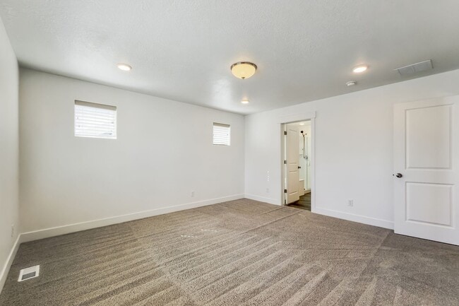 Building Photo - Spacious 4 Bed, 3.5 Bath Pet-Friendly Home with Central Air & 2-Car Garage! - Available NOW!