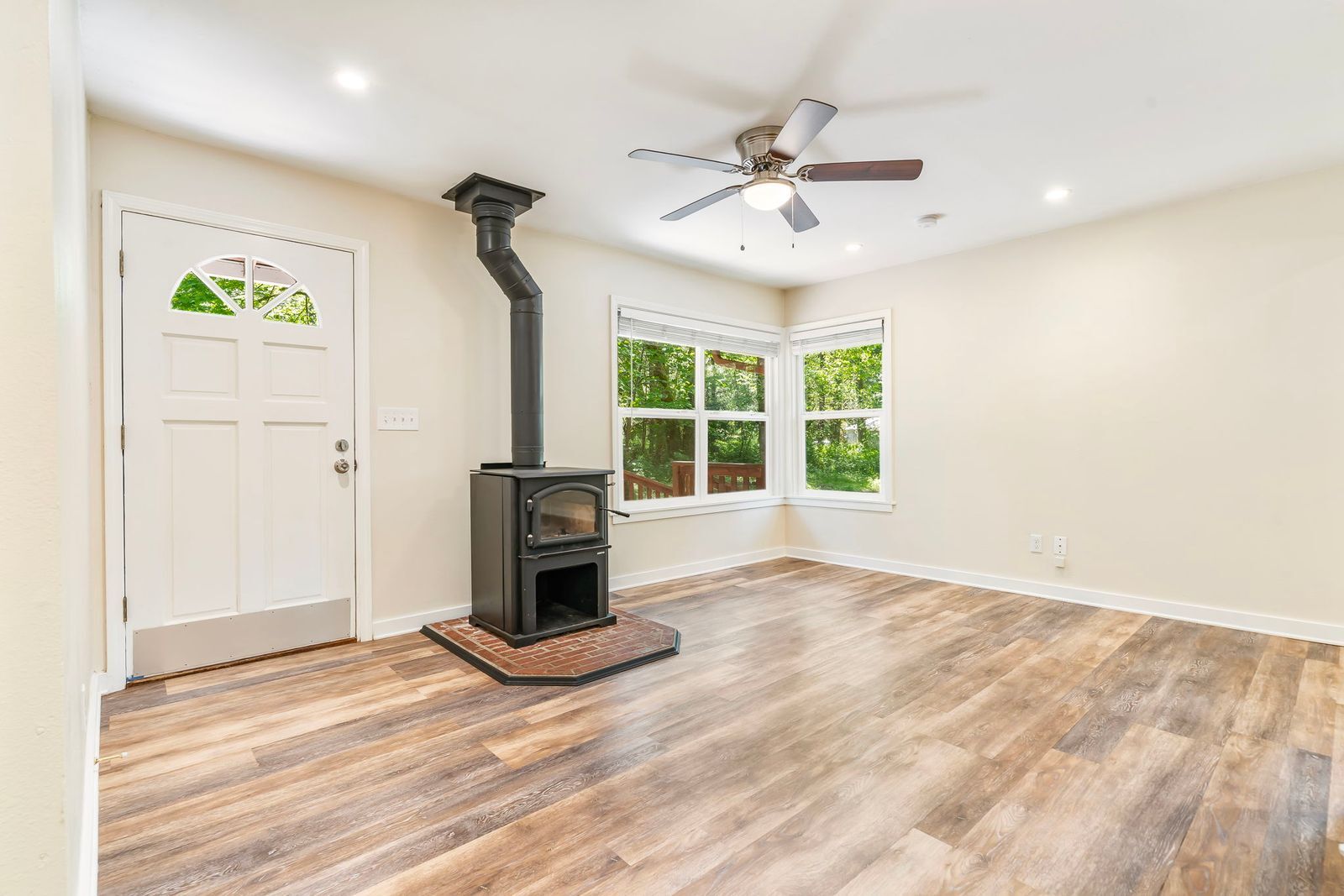 Front Room with Windows - 20220 E Peter Pl