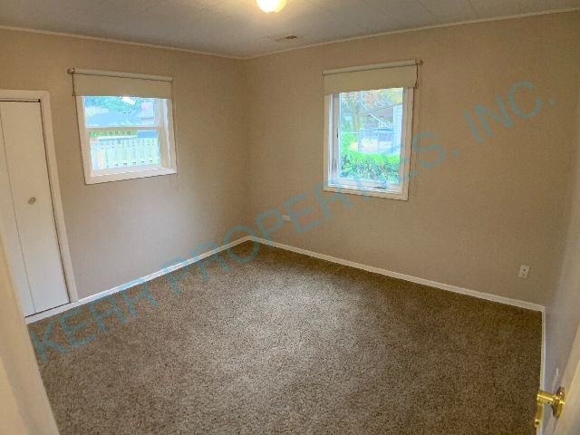 Building Photo - FREE RENT! Spacious 3-Bedroom Duplex Retre...