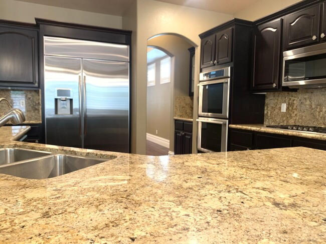 Building Photo - Four Bedrooms, Loft, and Downstairs Bedroo...