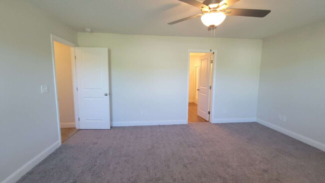 Building Photo - "Spacious 4-Bedroom Retreat with Modern Gr...