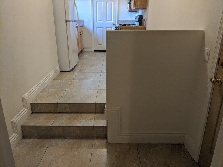 steps up to kitchen area - 24381 Santa Clara Ave