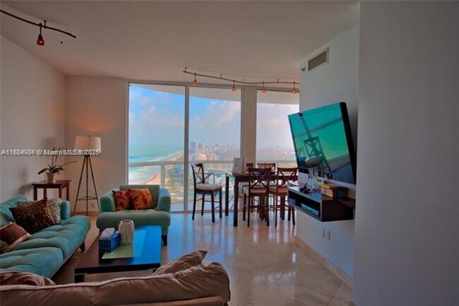Building Photo - 6365 Collins Ave