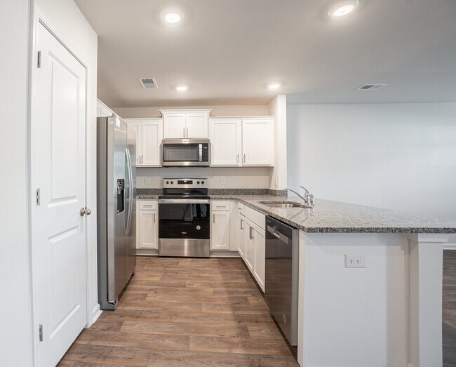 Building Photo - End unit! Available Early June!