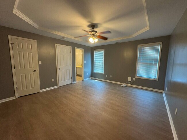 Building Photo - Spacious 4-Bedroom Sanctuary with Cozy Fireplace on Chimney Swift Drive!